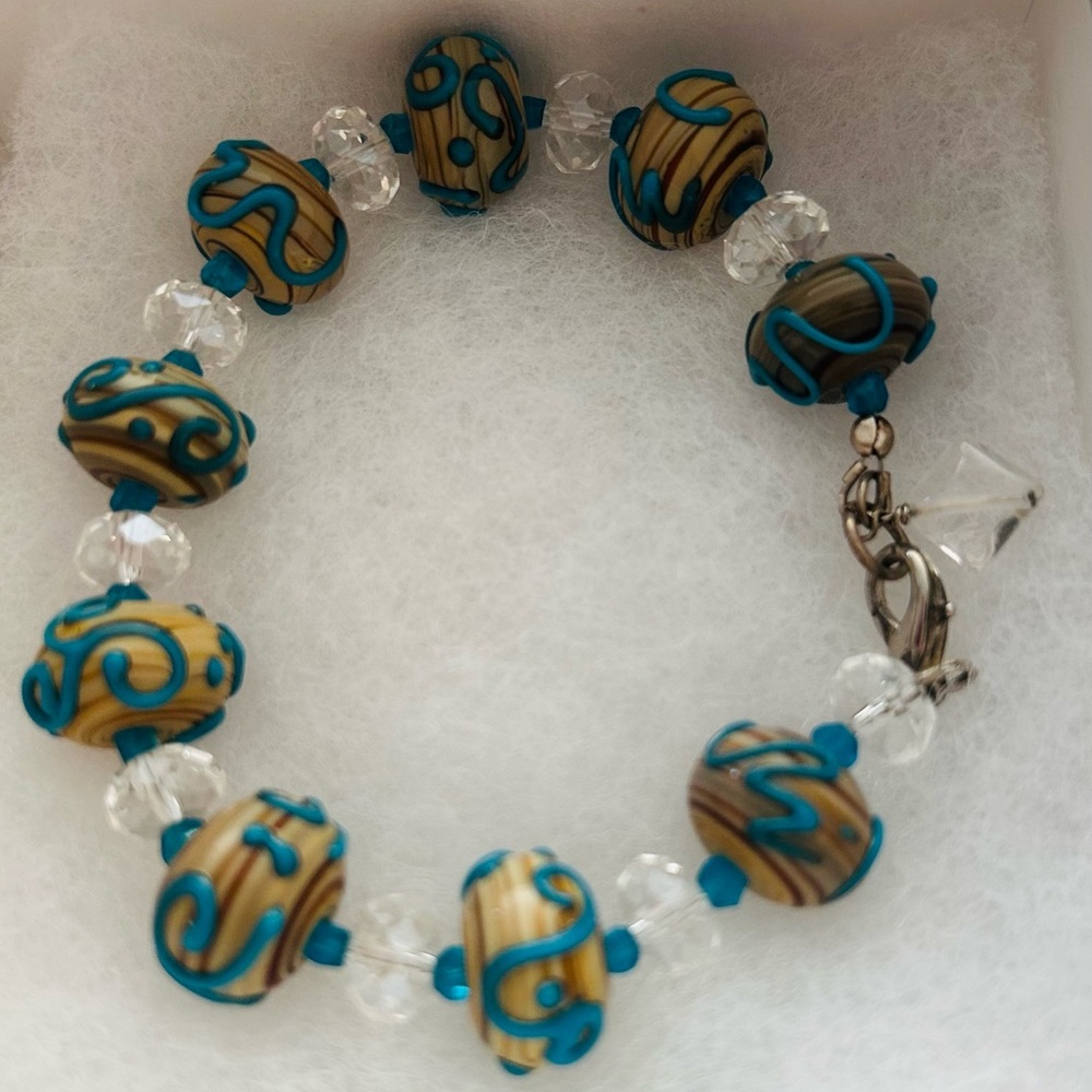 Elegant Beaded Bracelet with Blue Accents